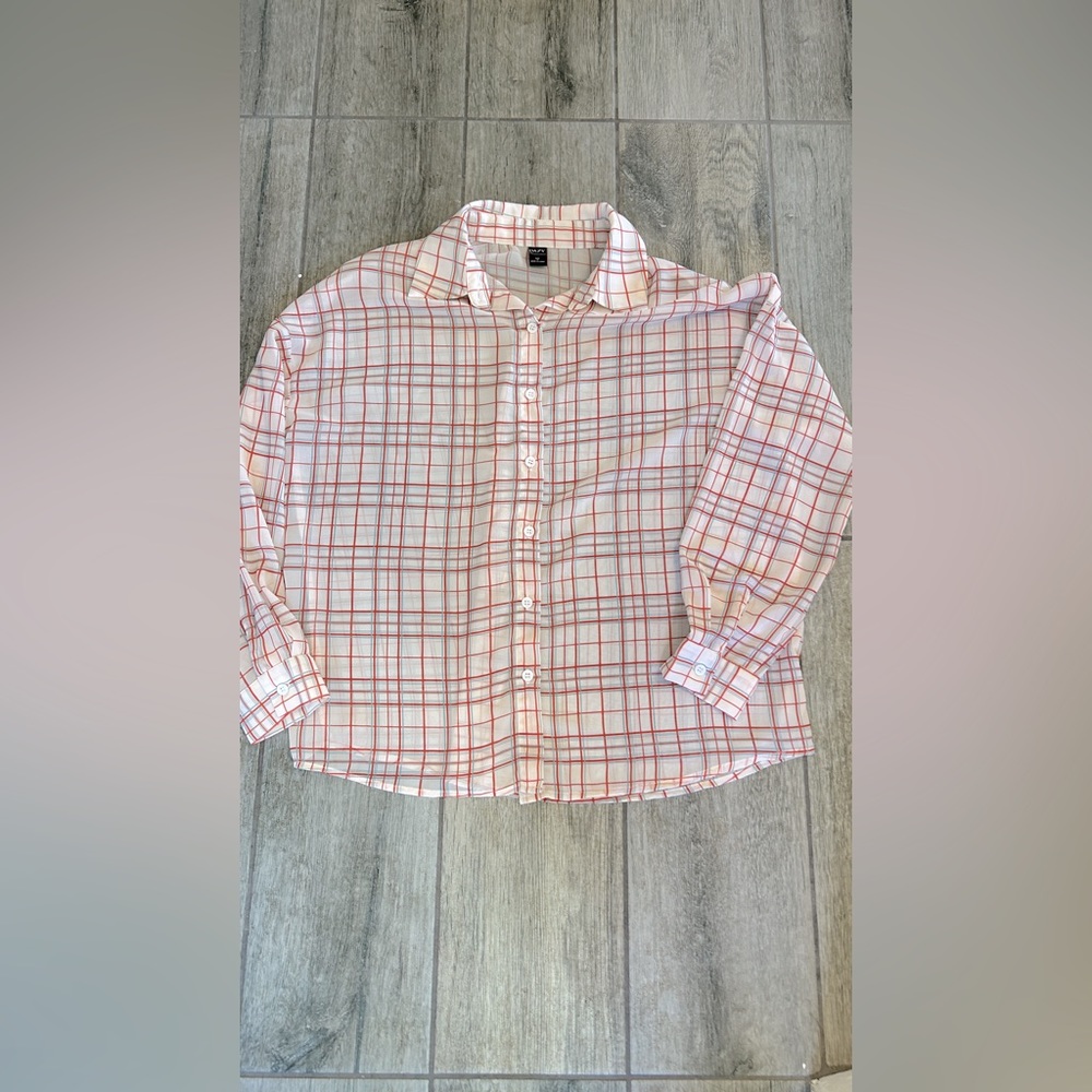 Daisy brand sheer material flannel looking long sleeve top. NWOT.